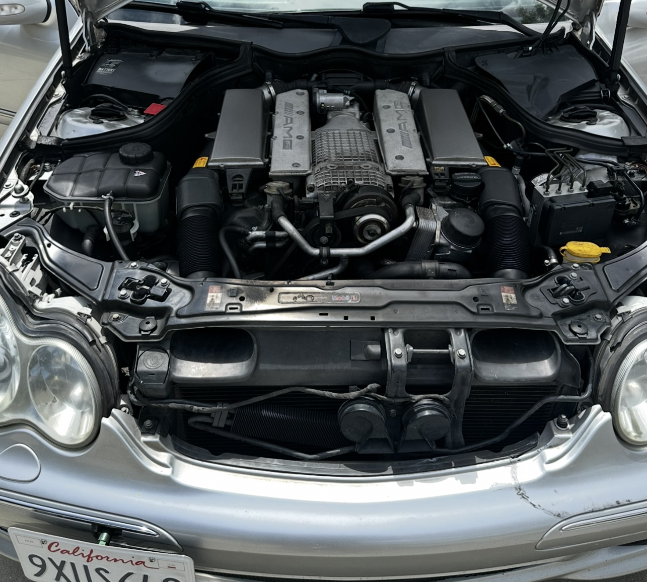 The C32 AMG engine bay