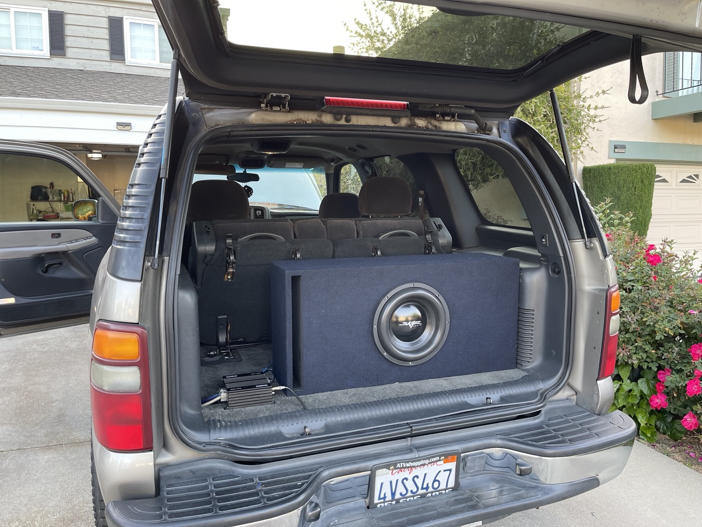 Customer SUV, April 2022: subwoofer enclosure and amplifier packaged in the rear cargo area